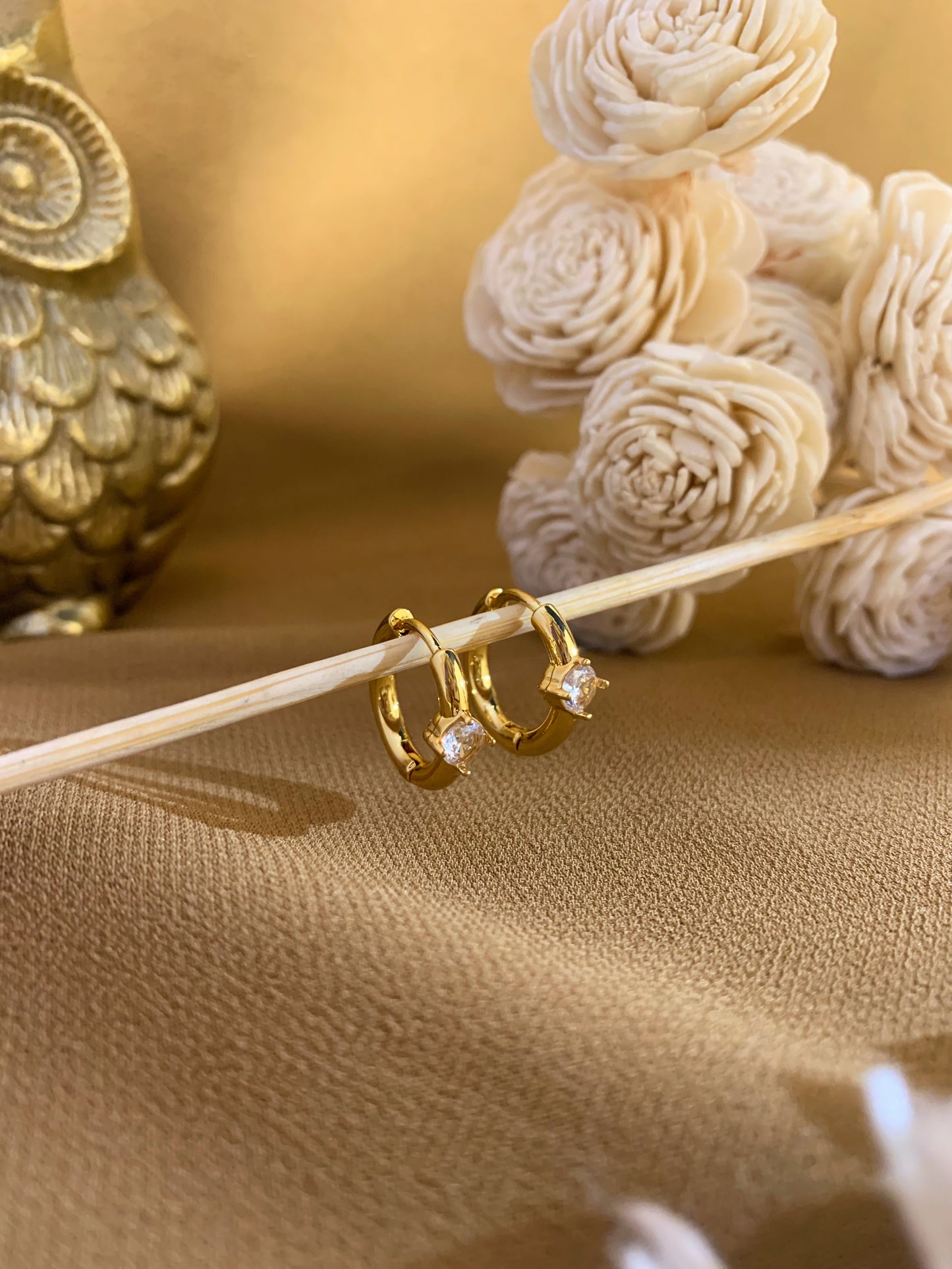 Tiny tressure huggies earing