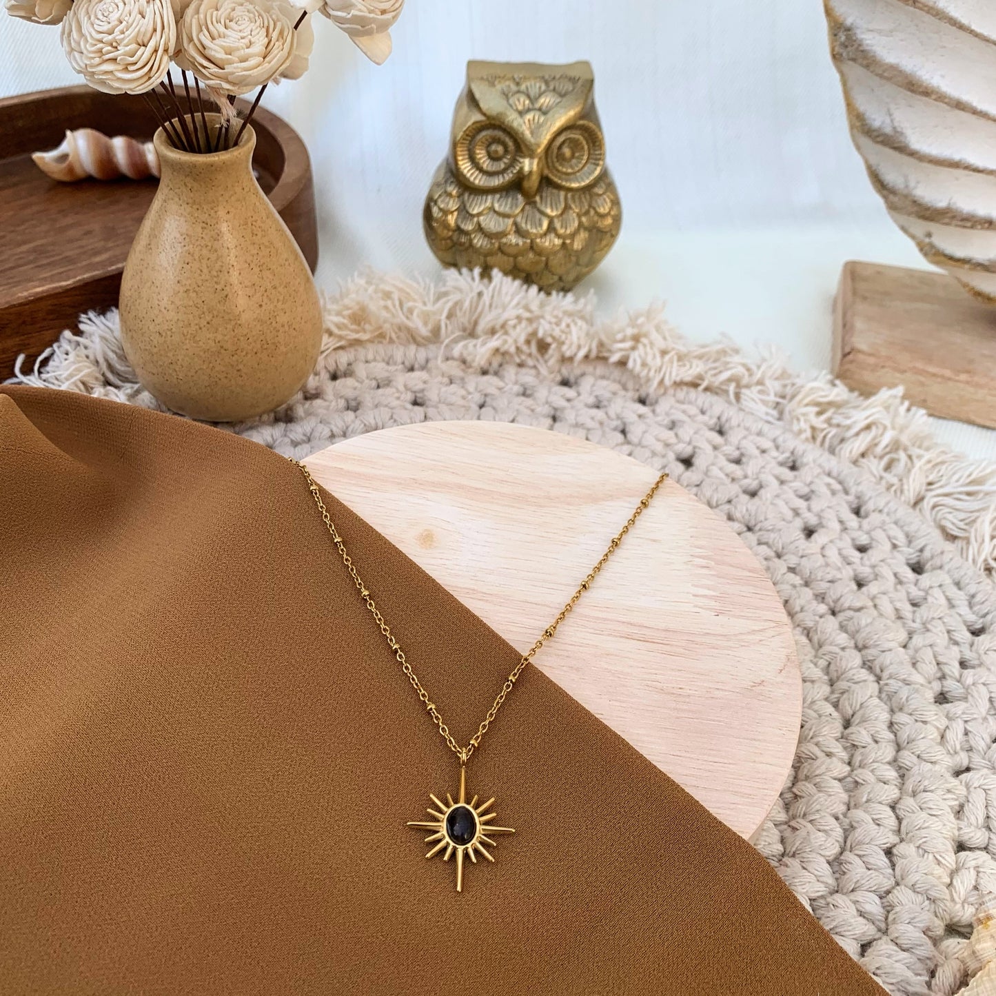 Sunray style black chain pendant