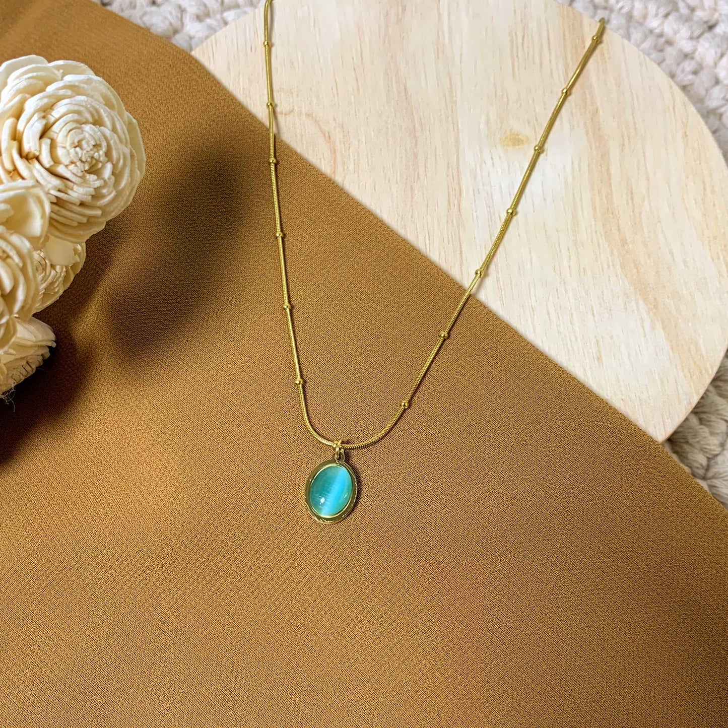 Ocean blue oval chain pendant