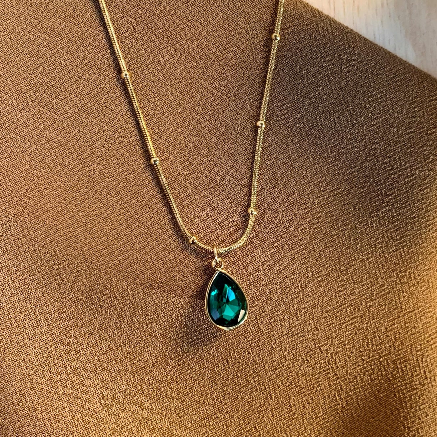 Emerald green drop shape chain pendant