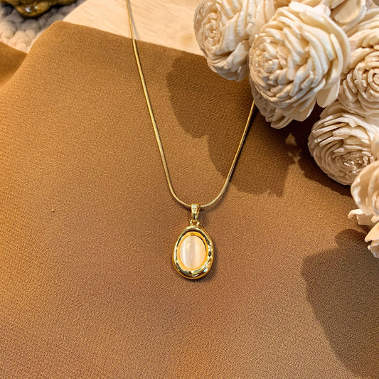 Pebble Shape cream stone chain pendant