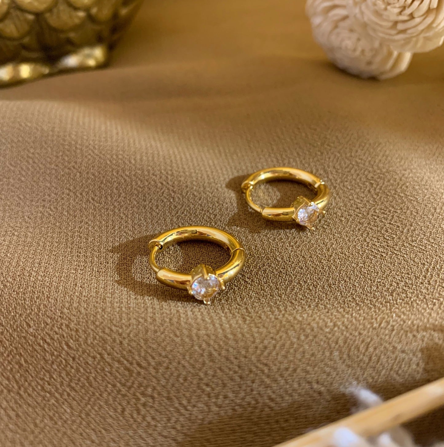 Tiny tressure huggies earing