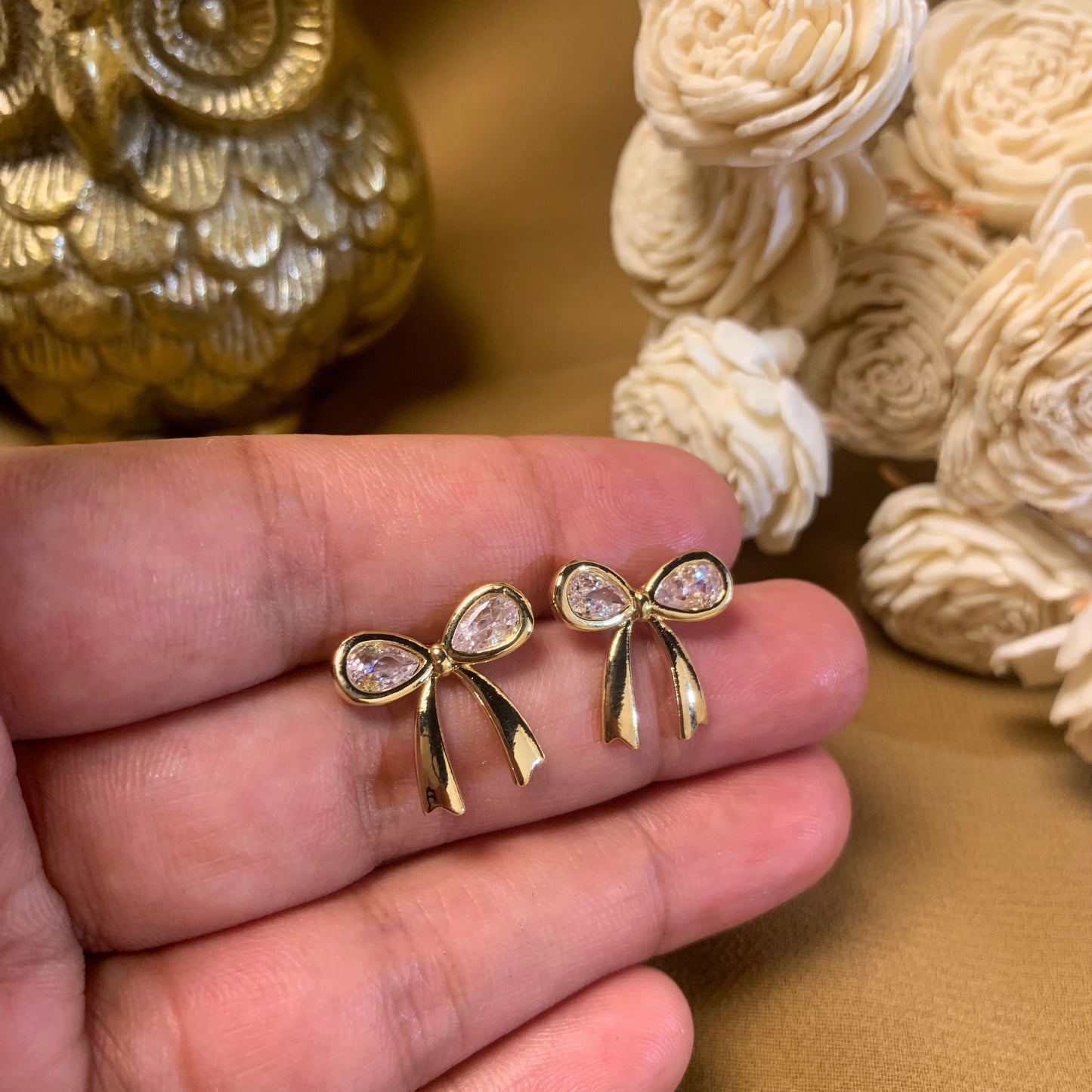 Bow golden charm